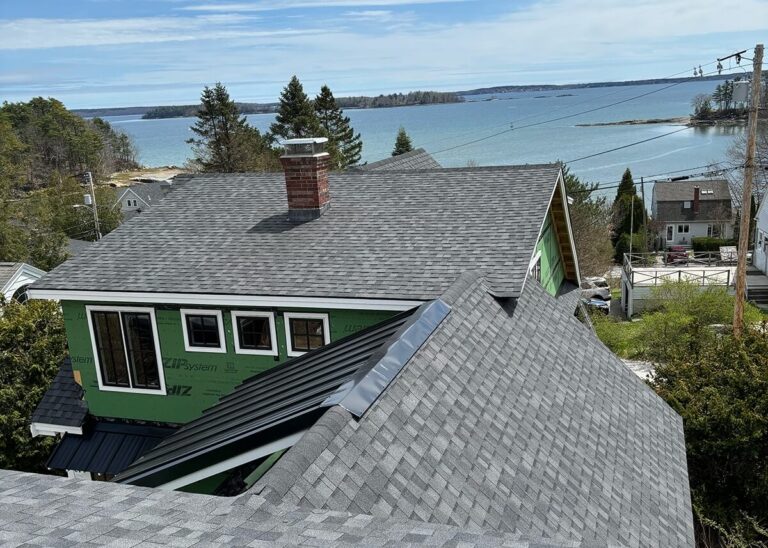 view of a custom roofing job on a coastal maine home